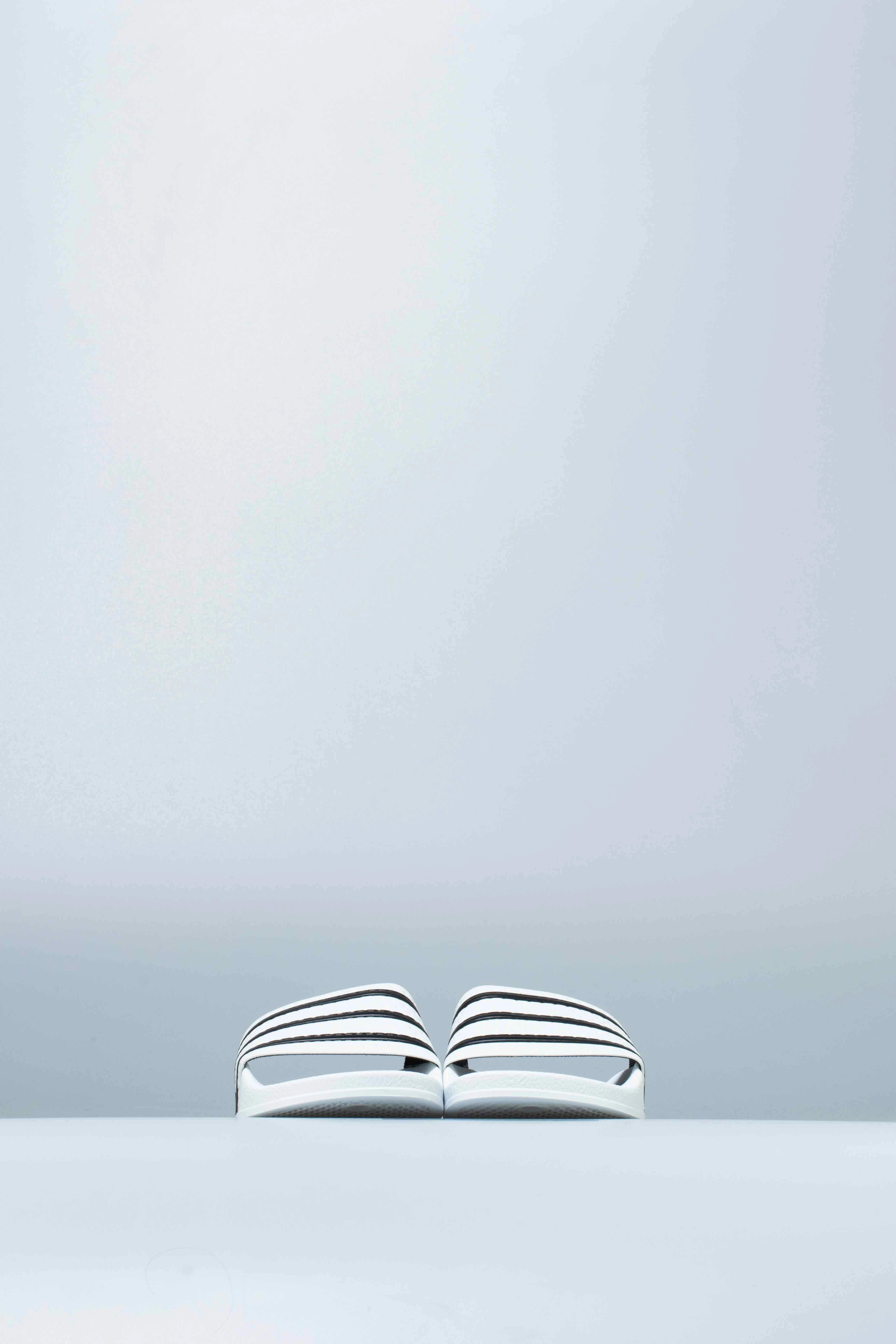 Adilette Mens Slides - White/Black Living Kitzbuhel Slippers